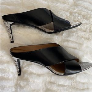 Calvin Klein black cross mules/ snake print detail